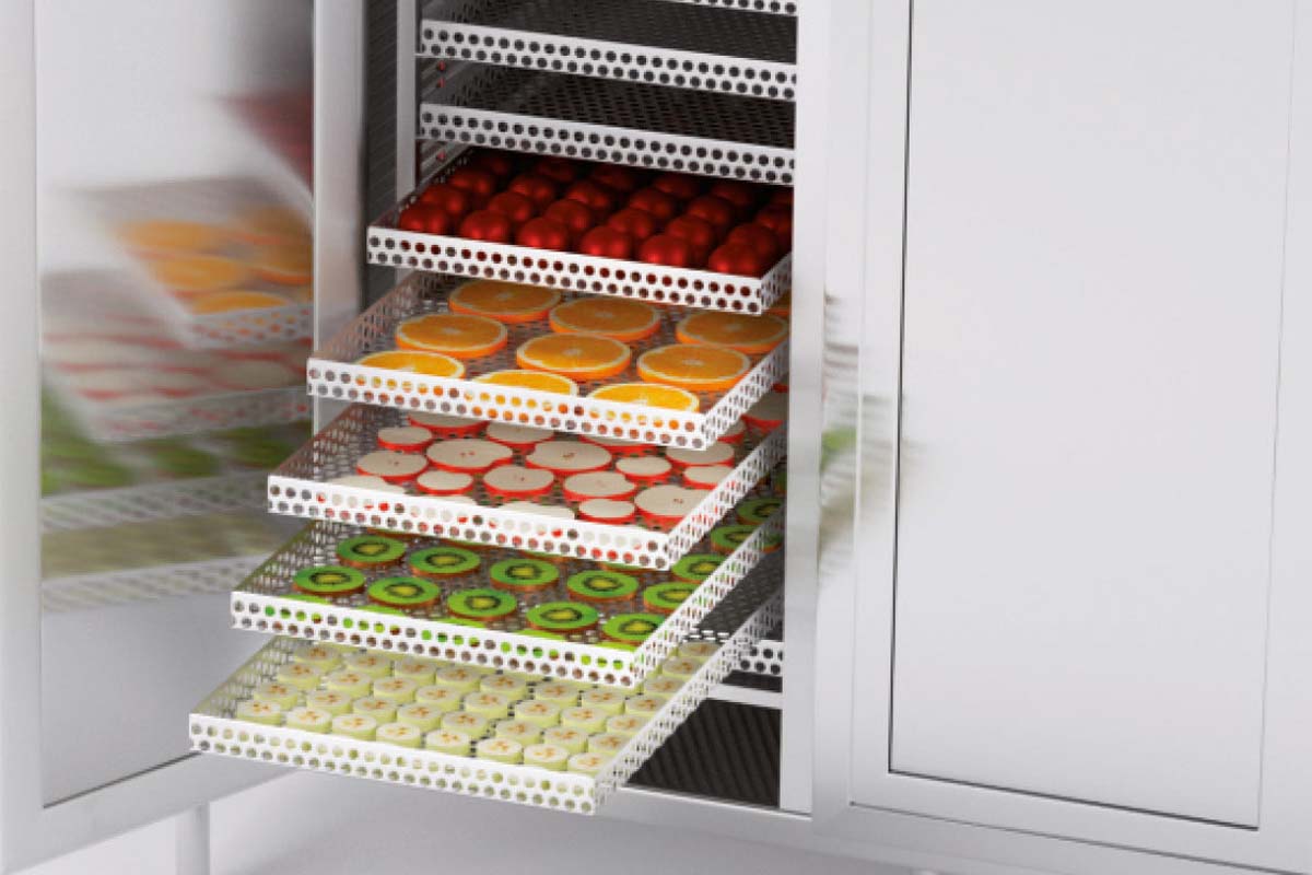 The image shows a grocery store filled with a variety of fruits and vegetables in cardboard boxes, with a blurred background and lights at the top.